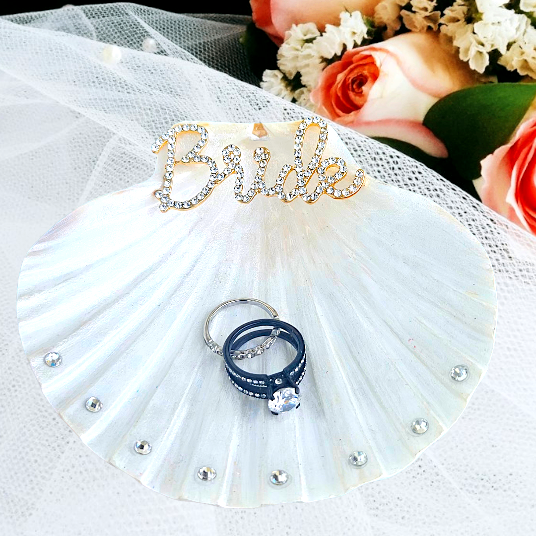 Pearl shell ring dish with rhinestone bride lettering.