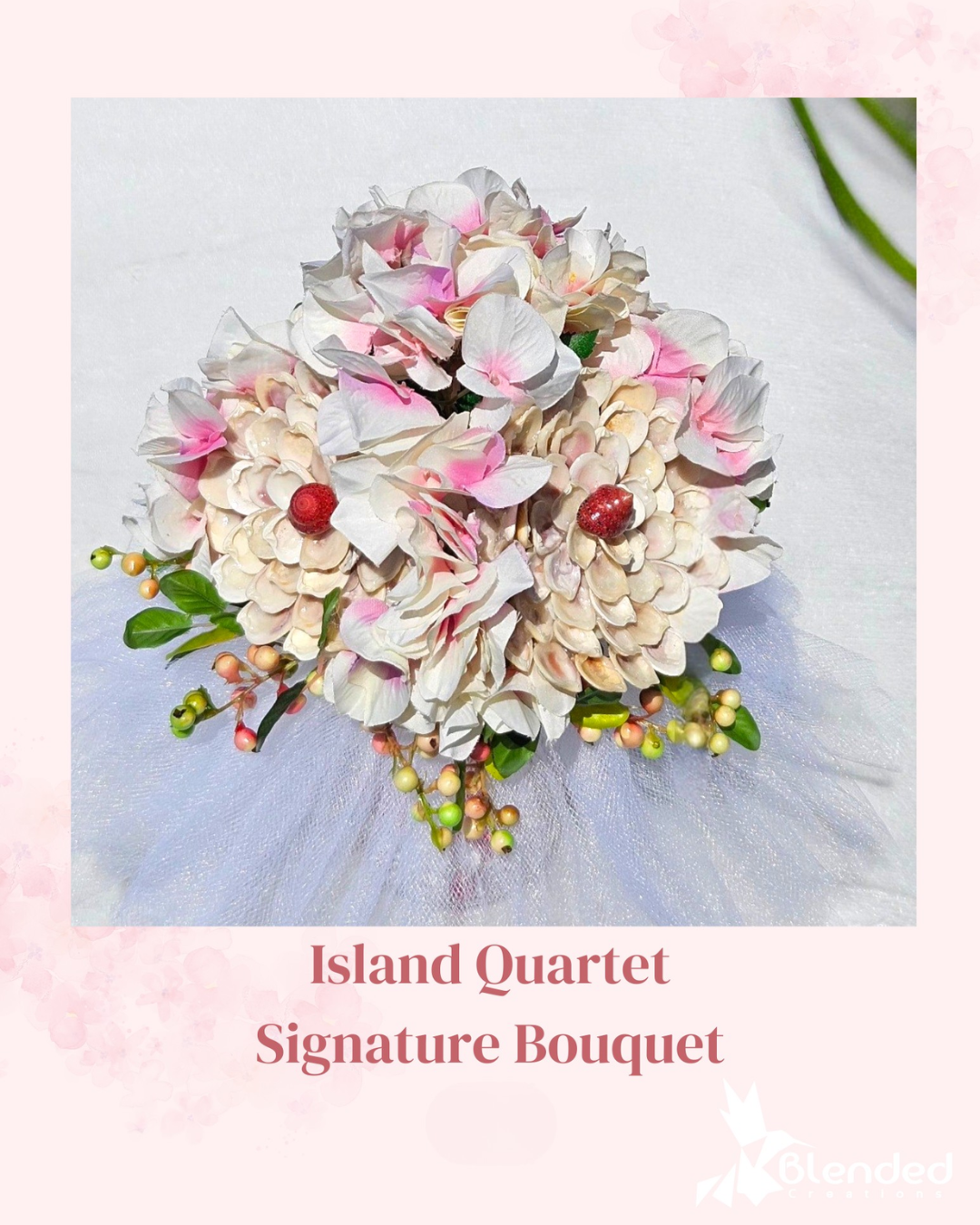 Soft blush wedding bouquet with shell blooms and berry accents.